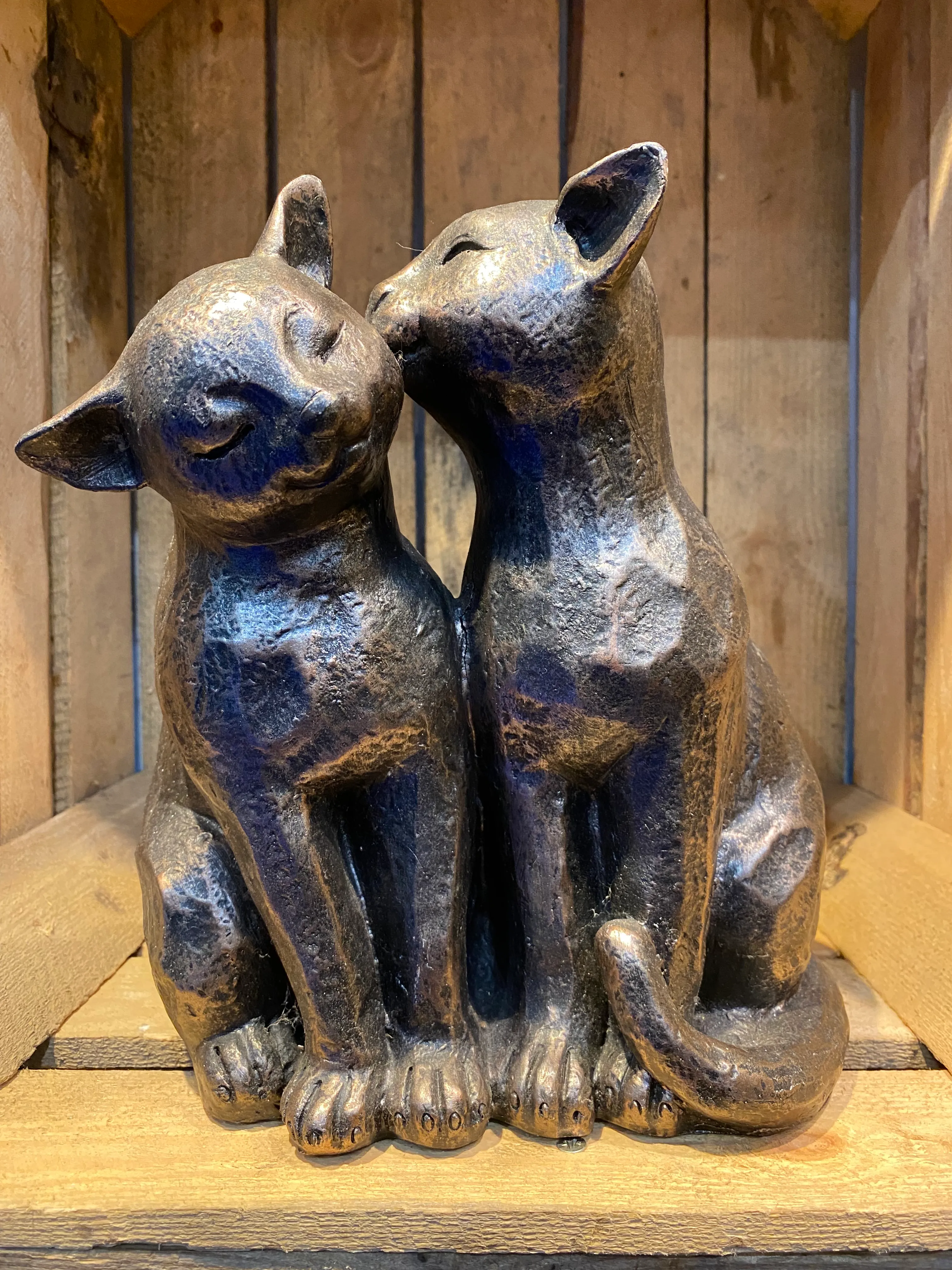 Two cats preening - bronze